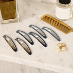 Multi-piece set of durable snap hair clips for women and girls