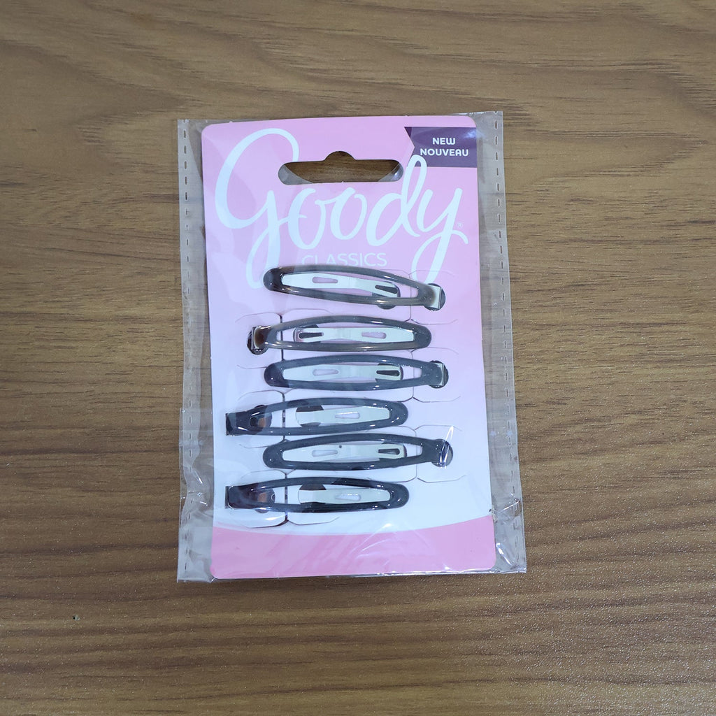 Model wearing snap hair clips styled in wavy hair