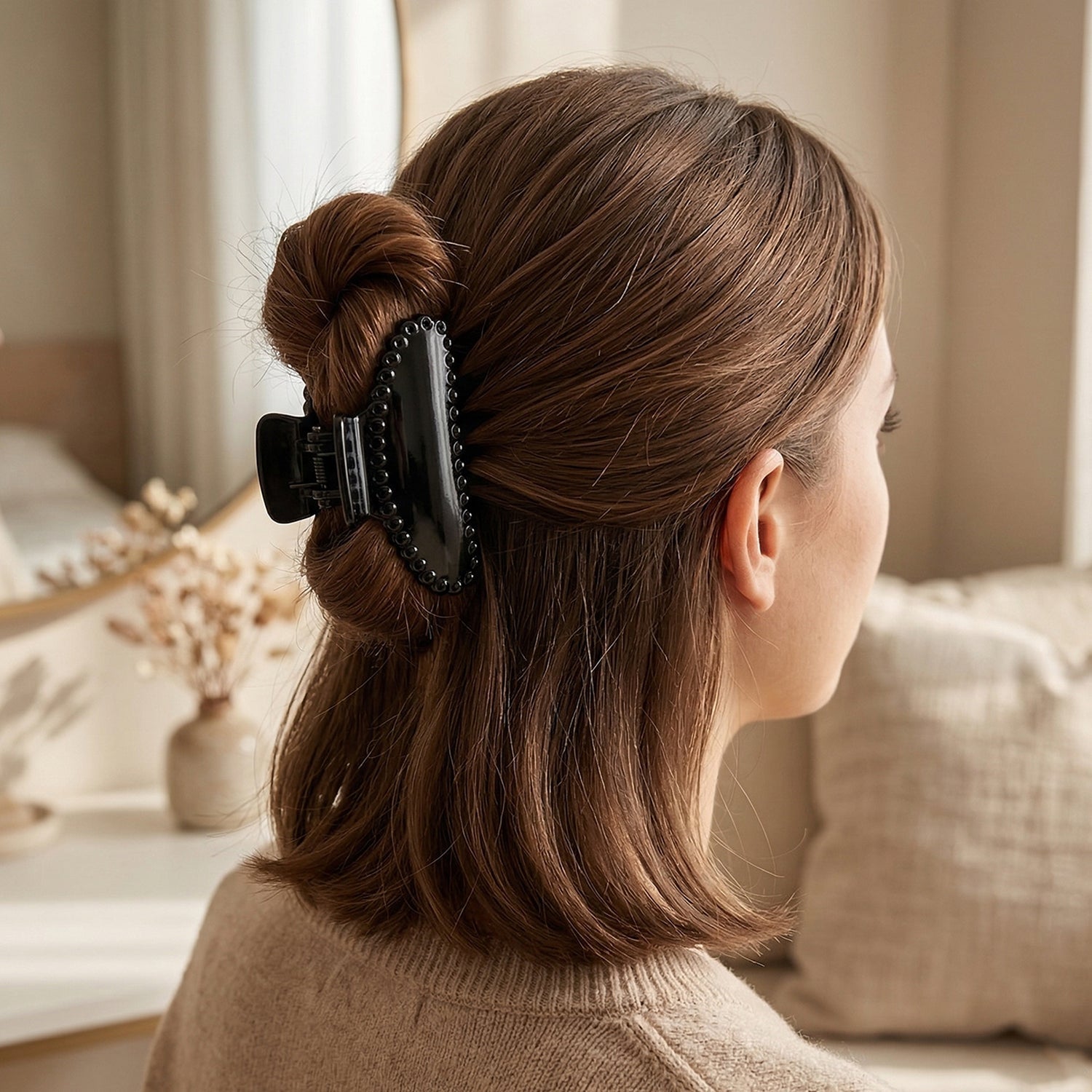 Black hair styling clip for everyday use in a sleek design