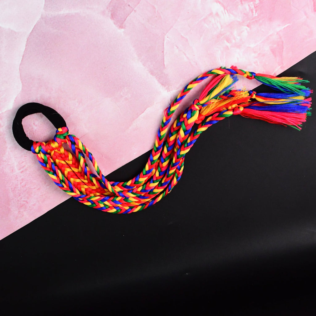 Hair extension showing elastic attachment and multicolor braided design
