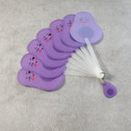 Detailed view of foldable pocket fan with keychain accessory