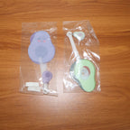 Assorted colorful designs of foldable pocket fans in mix colors