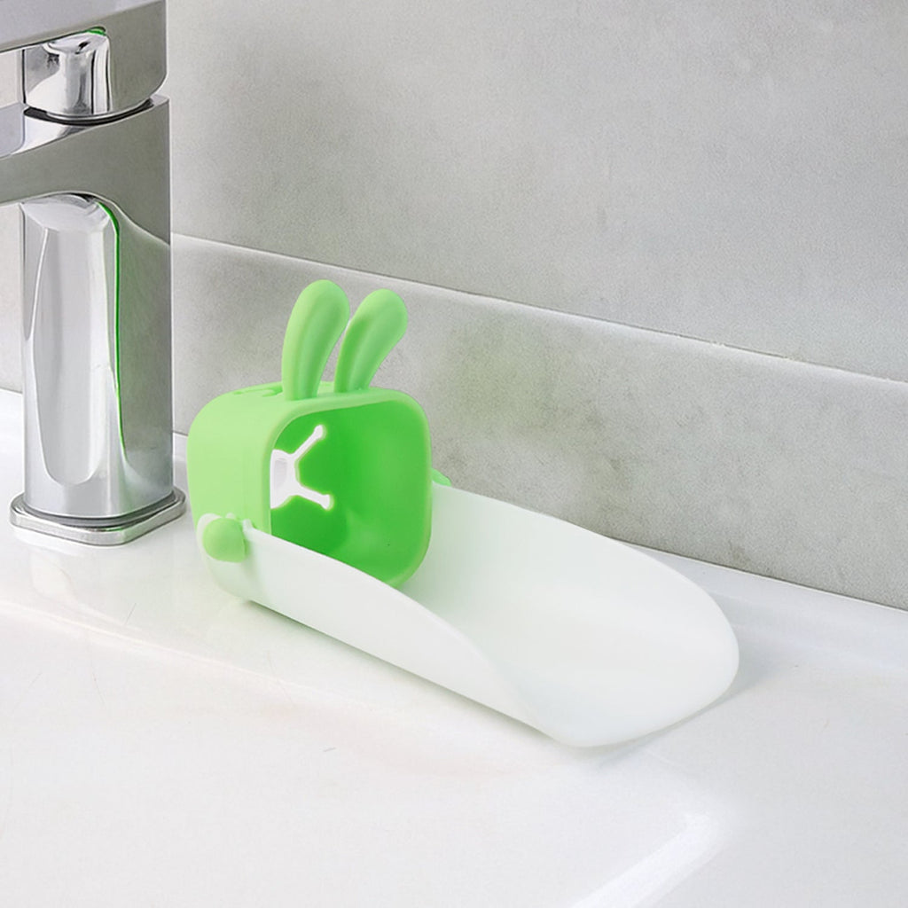 Hand demonstrating the flexible, durable silicone material of the faucet extender.