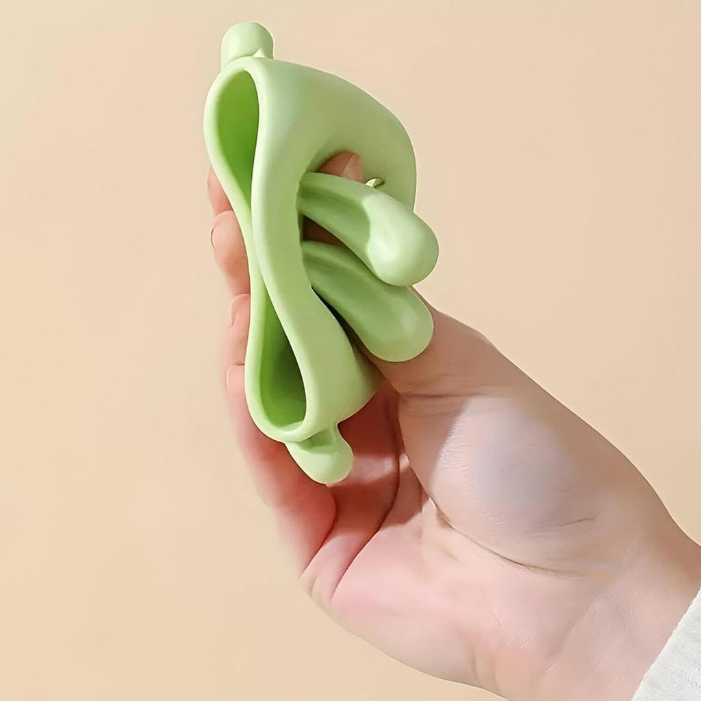 Close-up of the soft, flexible bear design of the Kids Faucet Extender on a sink.
