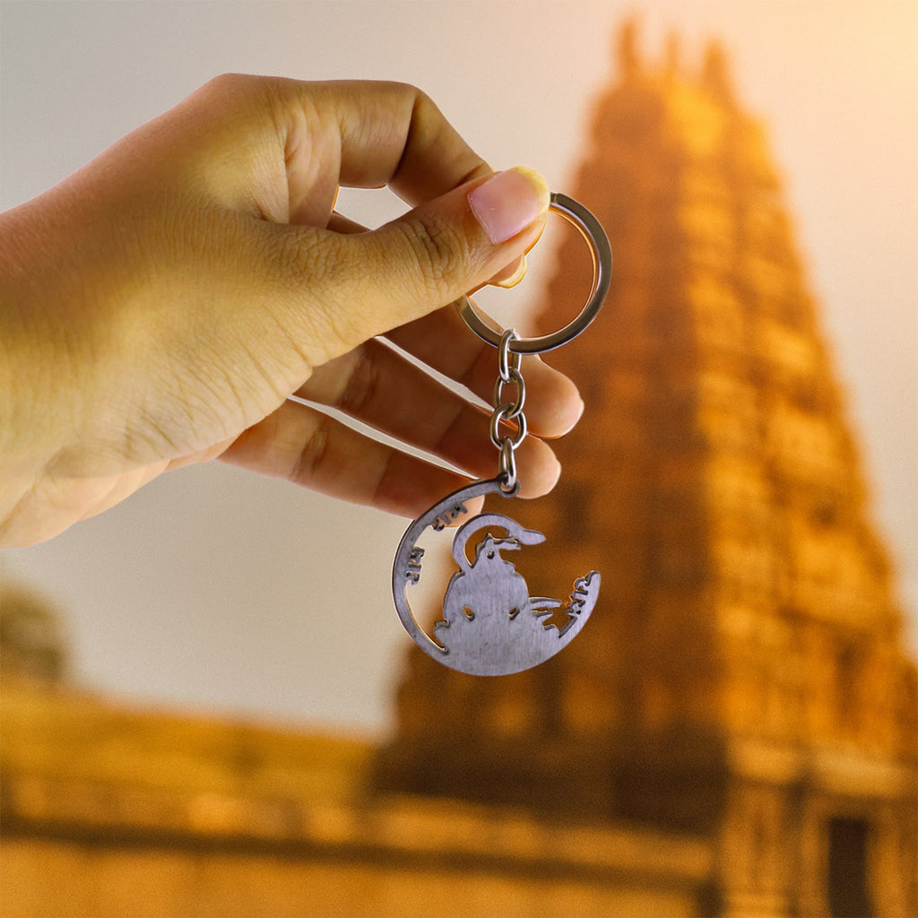 Jai Shri Ram Keychain held comfortably in hand, showcasing its slim profile.
