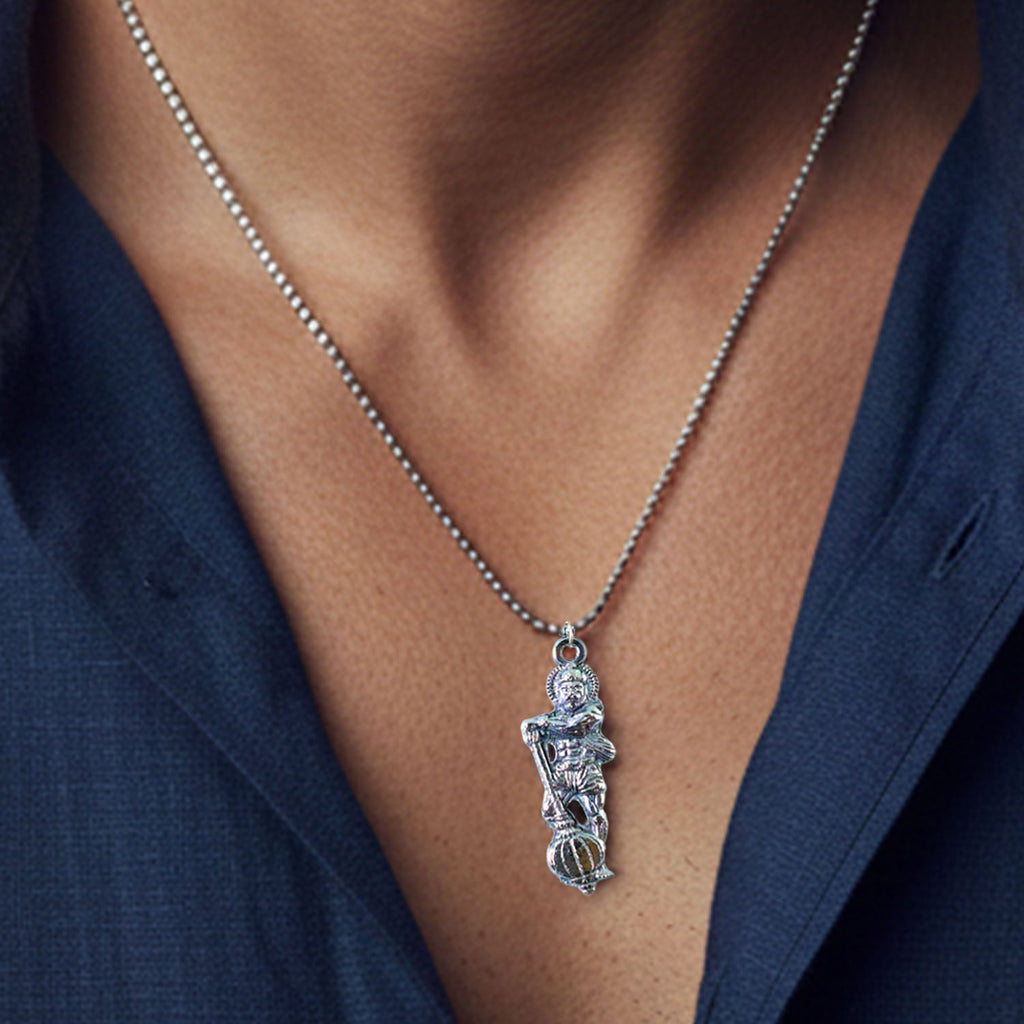 Side profile of the Hanuman Ji pendant, revealing the strong Gada motif.