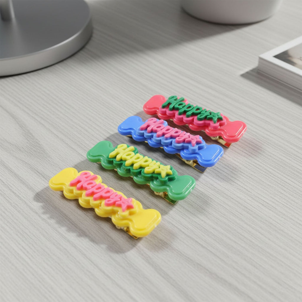 Close-up view of happy bone hair clips highlighting colorful, fun details