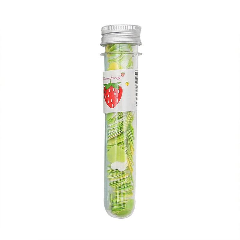 Test tube bottle filled with multicolor flower-shaped paper soap strips