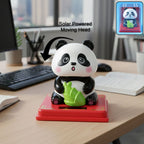 Solar powered moving head panda showpiece on red base