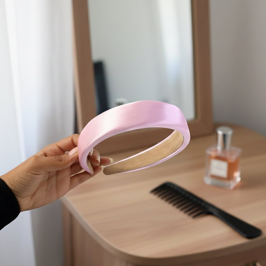 Smiling woman wearing the comfortable padded satin hairband