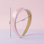 Detail shot emphasizing smooth satin finish of the padded hairband