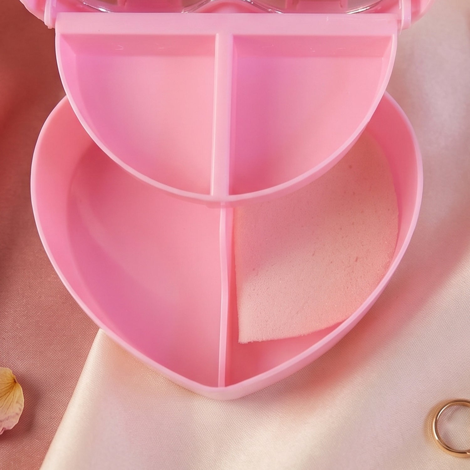 Side view of heart-shaped makeup storage box