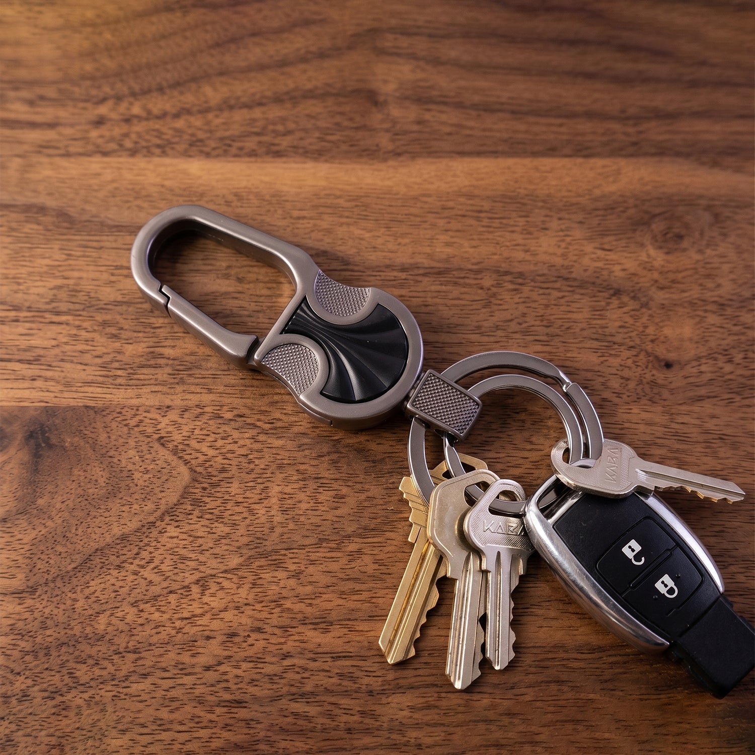 Compact metal key holder with modern finish and lock clip