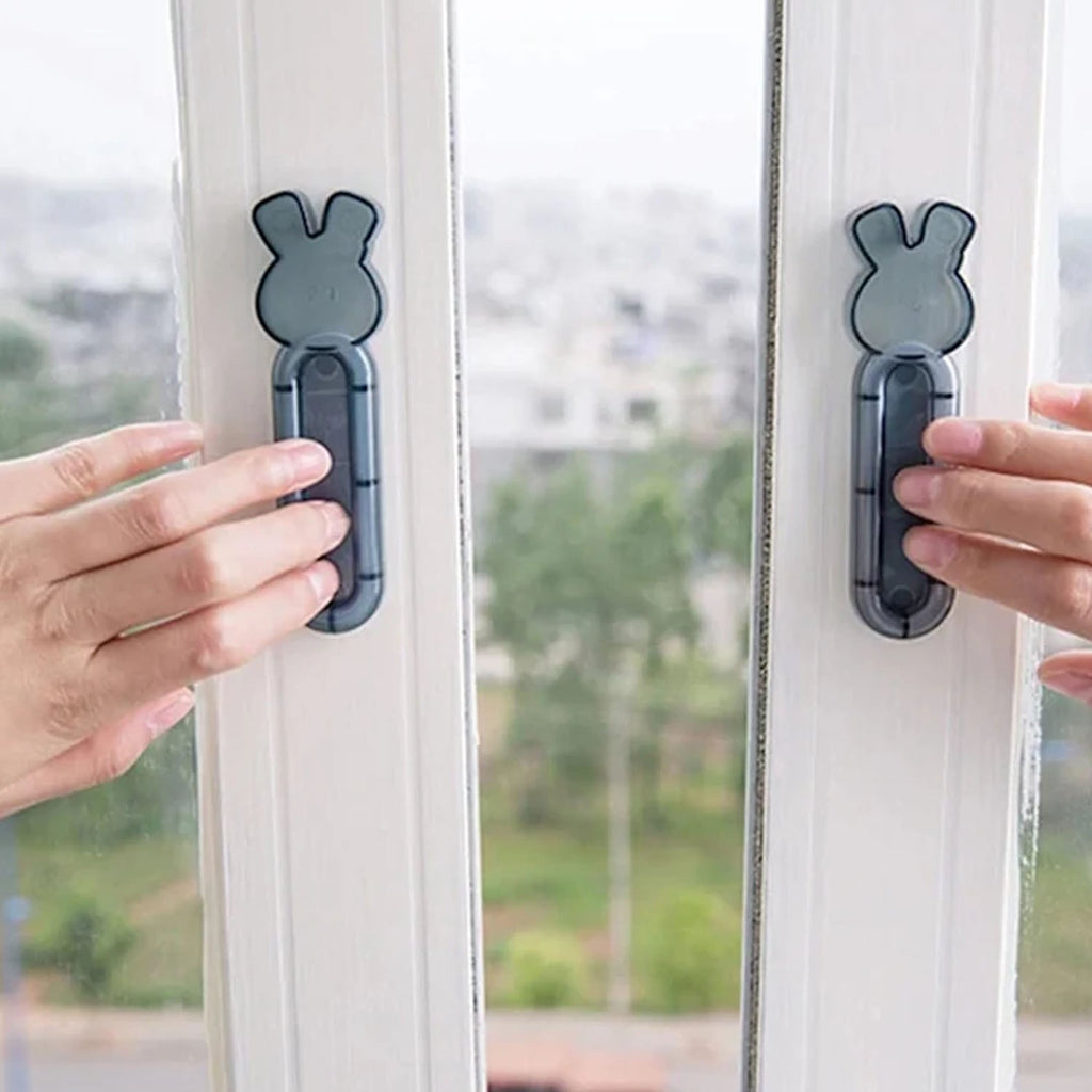 Close-up view of cartoon animal door stopper and wall protector combo