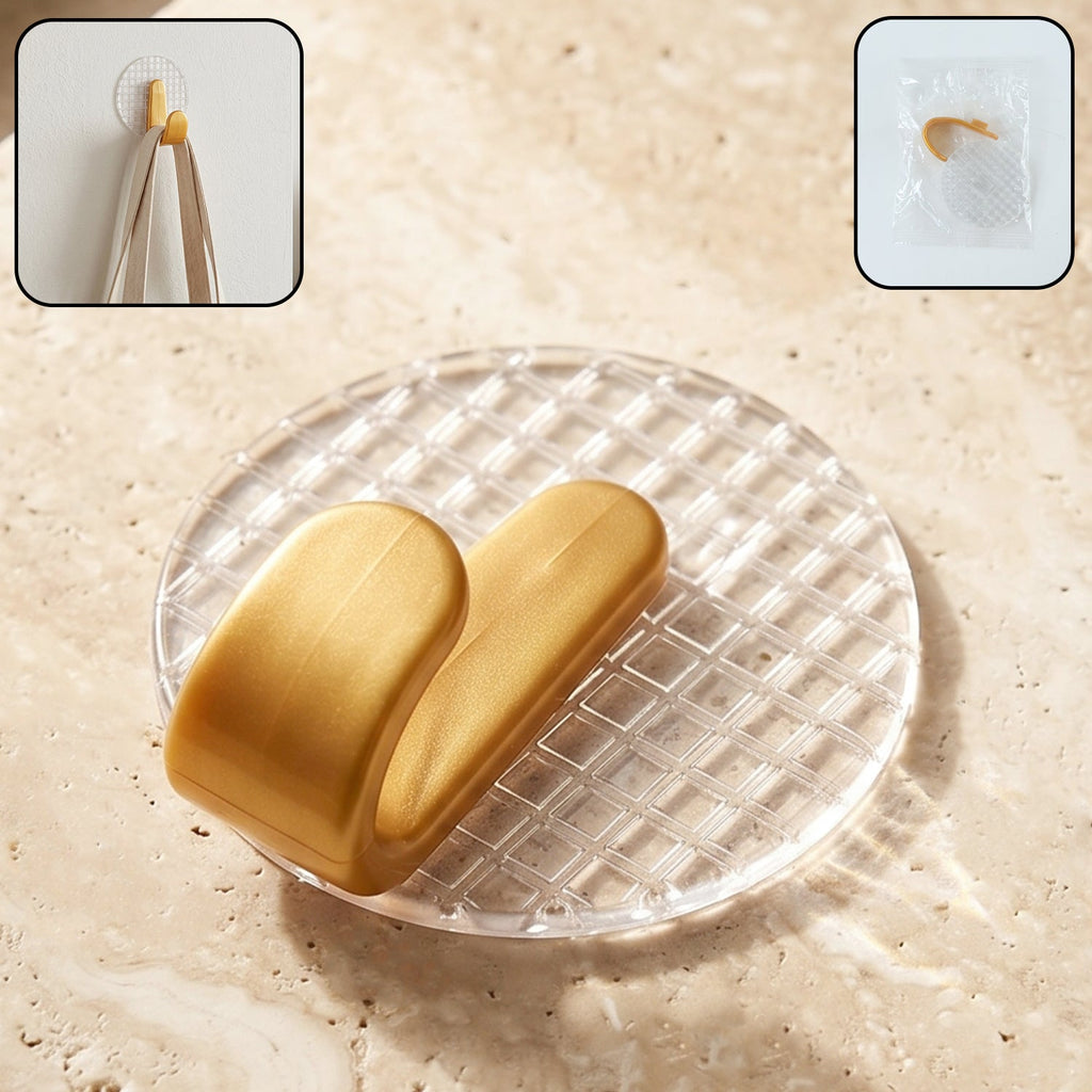 View of a transparent self adhesive wall hook installed in a bathroom for towels and accessories