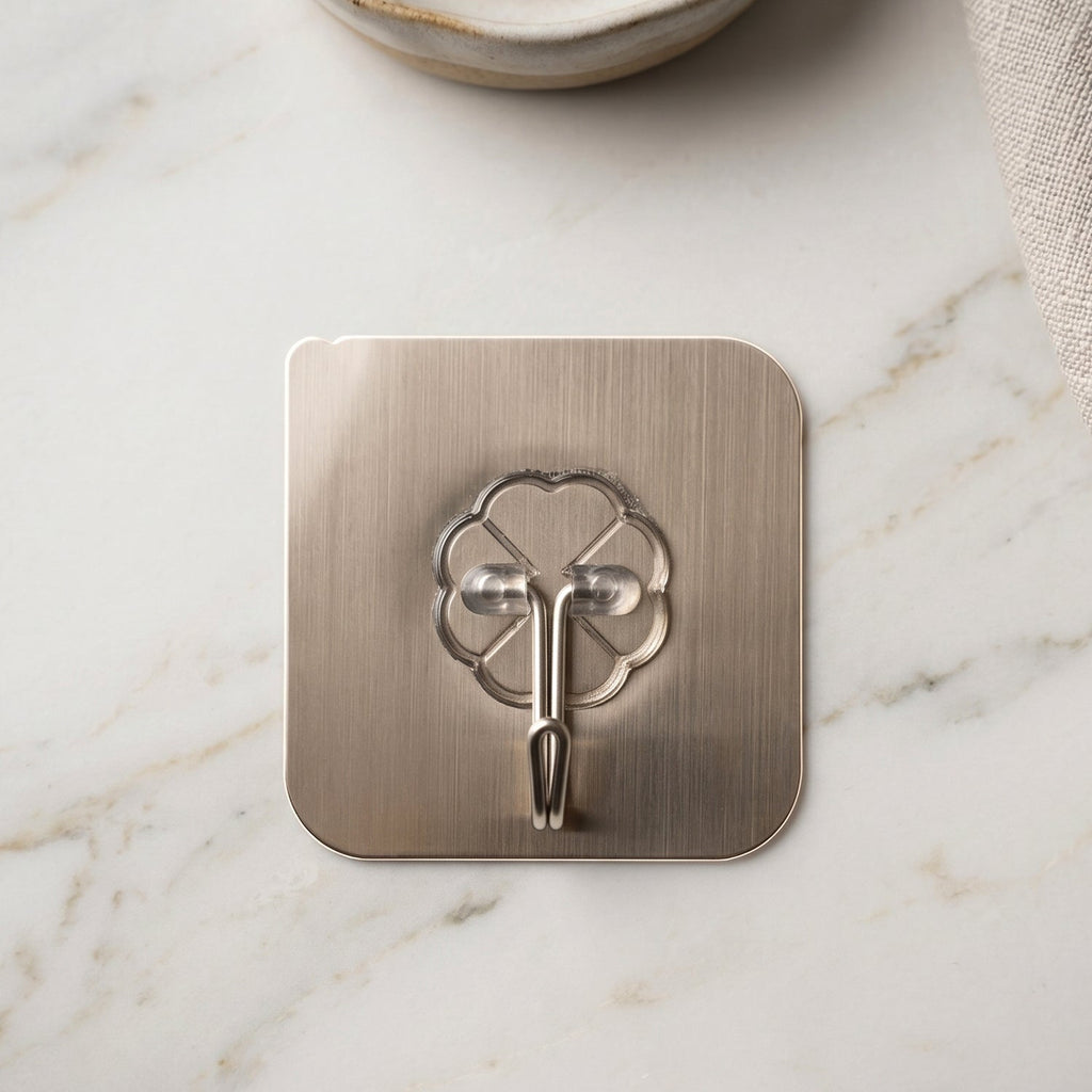 Multipurpose self-adhesive wall hook holding keys and small items