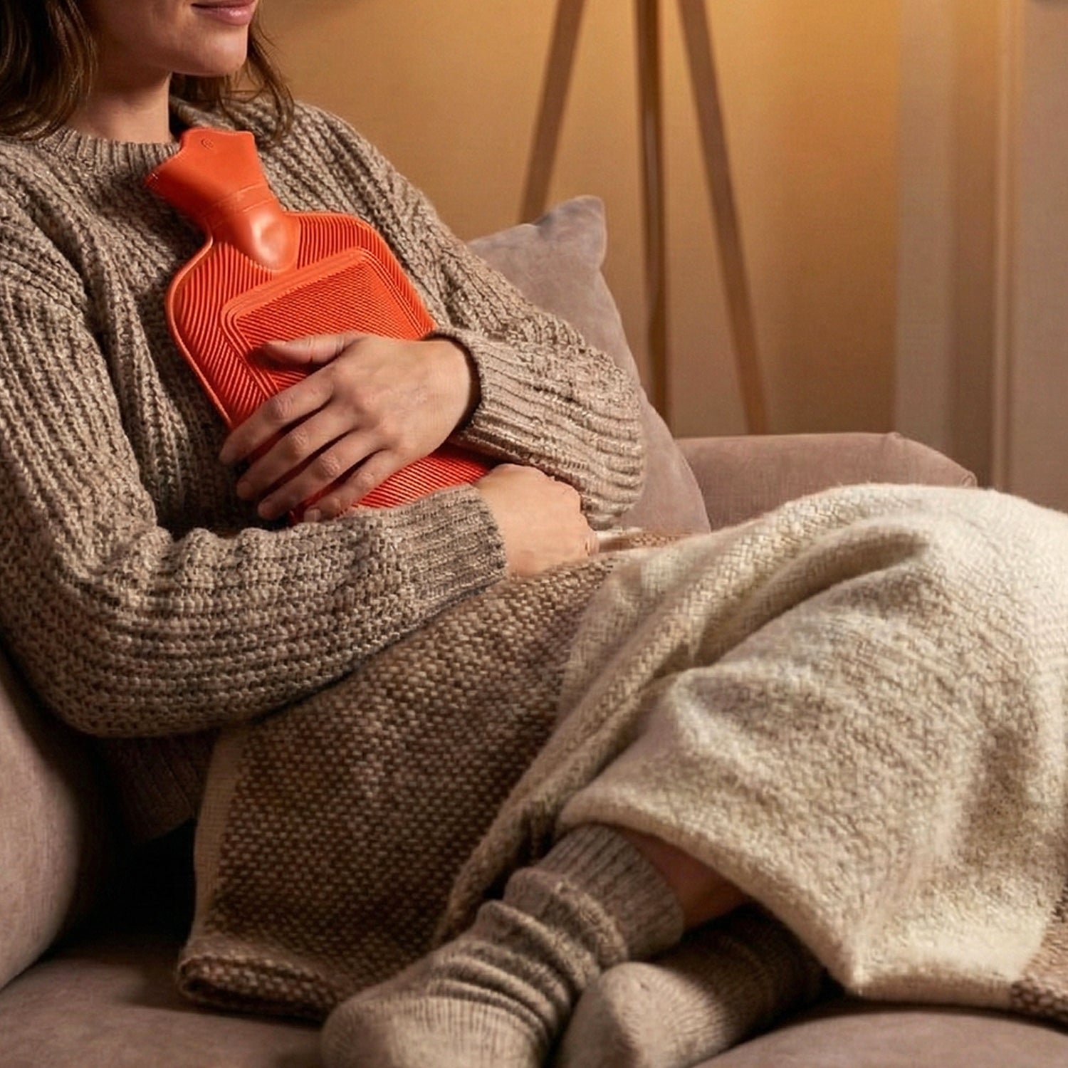 Portable rubber hot water bag ideal for relieving muscle and joint pain