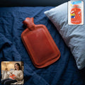 Durable red rubber hot water bag for pain relief with leak-proof design