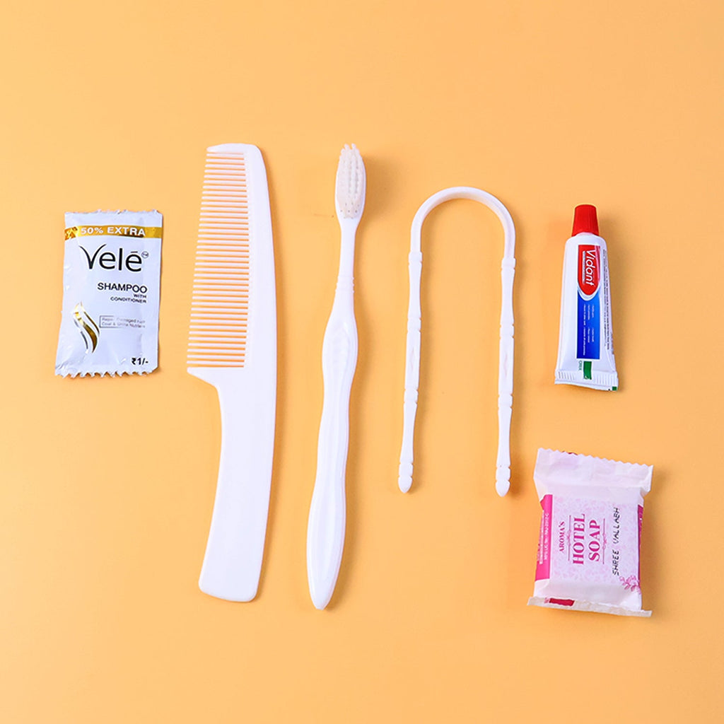 Hotel guest toiletry kit with toothbrush, soap and shampoo sachet