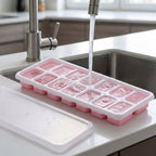 Easy release ice cube tray with lid in freezer