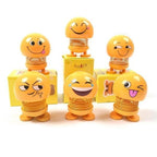 Collection of various smiling face spring toys, showcasing their playful design.