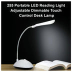 Compact portable LED reading light with sleek touch controls.