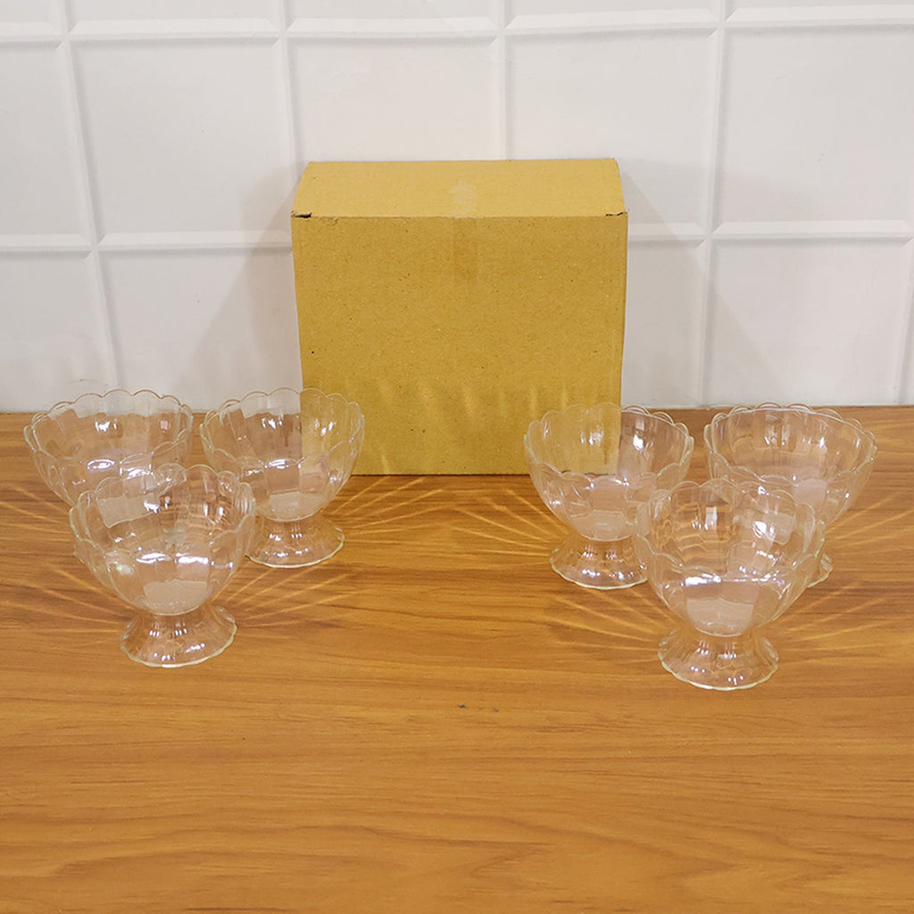 Complete set of six brown plastic serving dessert bowls ready for use.