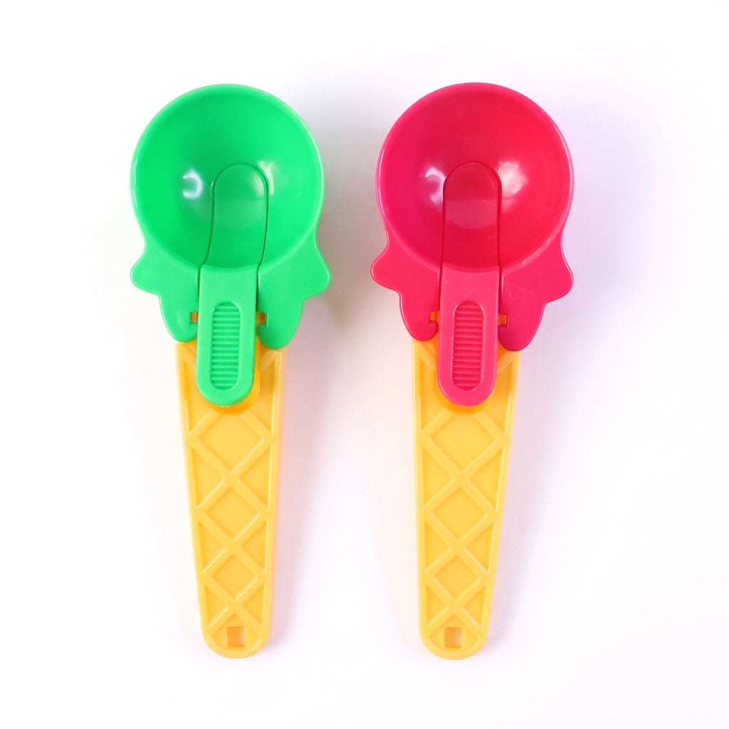 Colorful green and red plastic scoops designed for frozen desserts.