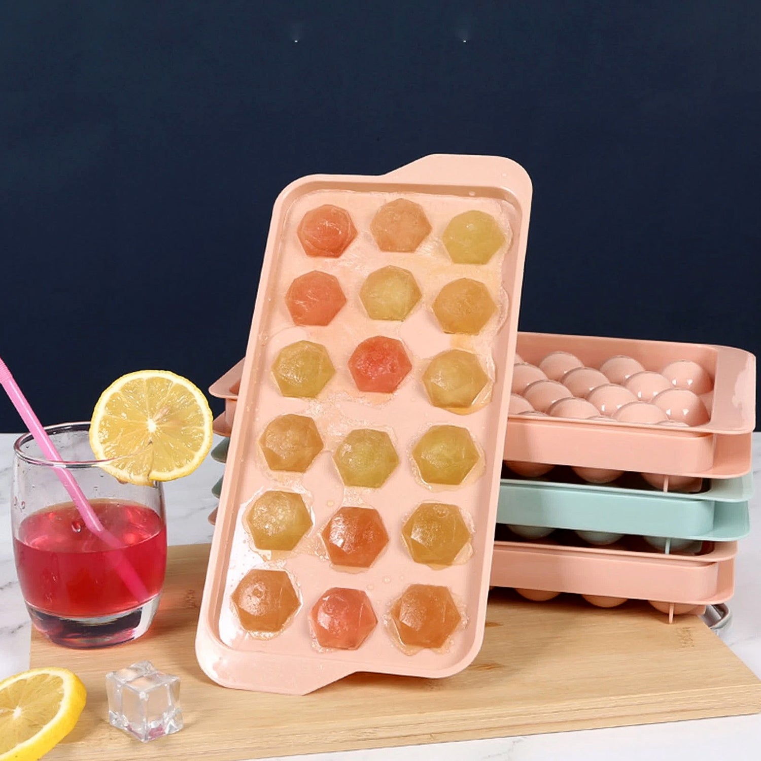 Empty plastic ice cube tray showing diamond-shaped molds