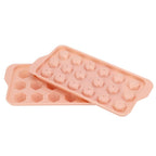 Plastic ice cube tray filled with liquid ready for freezing