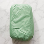 Unfolded inflatable air sofa on grass for outdoor lounging