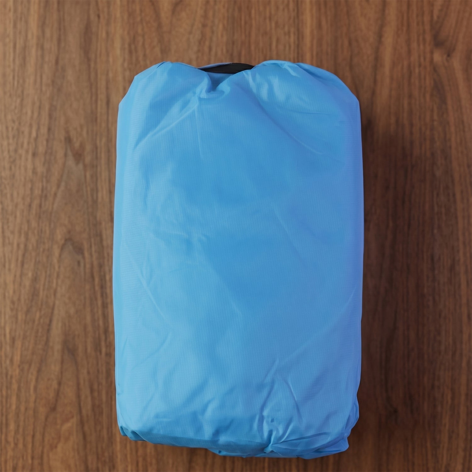Side view of ergonomic blue inflatable air sofa