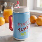 Insulated drinking mug shown with straw, ready for use.