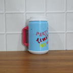 Lifestyle shot of the reusable insulated mug with straw, ideal for daily use.