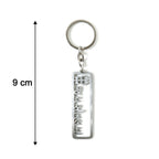 Close-up of Jay Sonal Ma devotional keychain in metallic finish