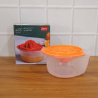 Top view of pomegranate seed remover with reversible lid in juicing position