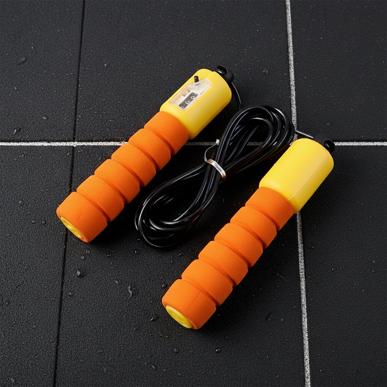 Adjustable fitness jump rope coiled for portability and easy storage