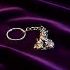 Bal Krishna Makhan Chor keychain attached to a set of everyday keys