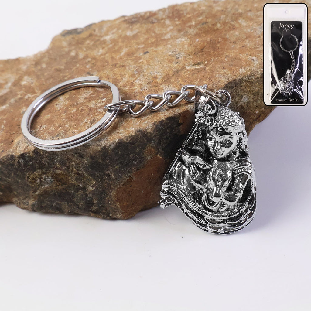 Silver finish metal keychain with detailed Bal Krishna idol charm