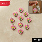 Cute heart flower keychain on pink background