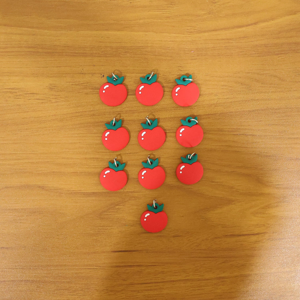 Novelty red apple bag accessory with playful design