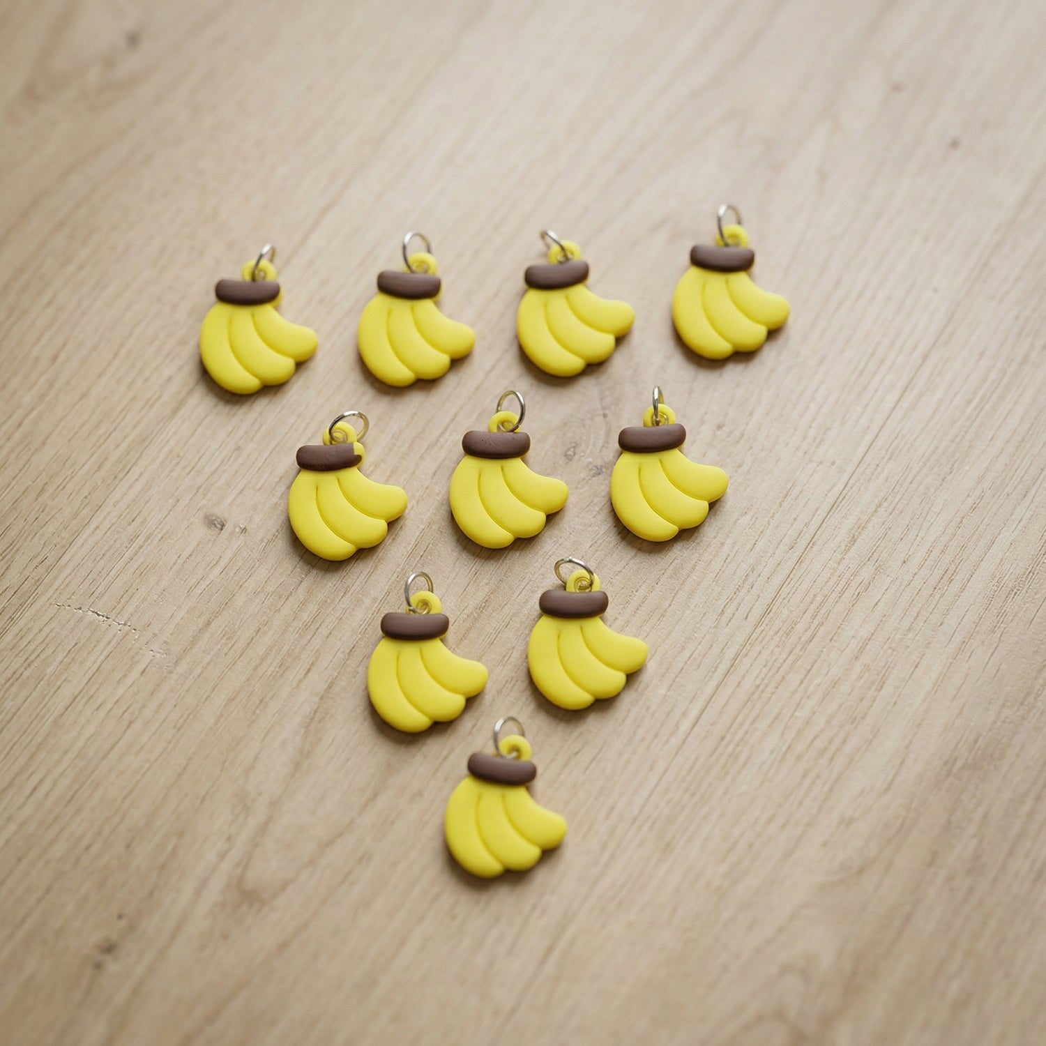 Group of yellow banana-shaped keychains