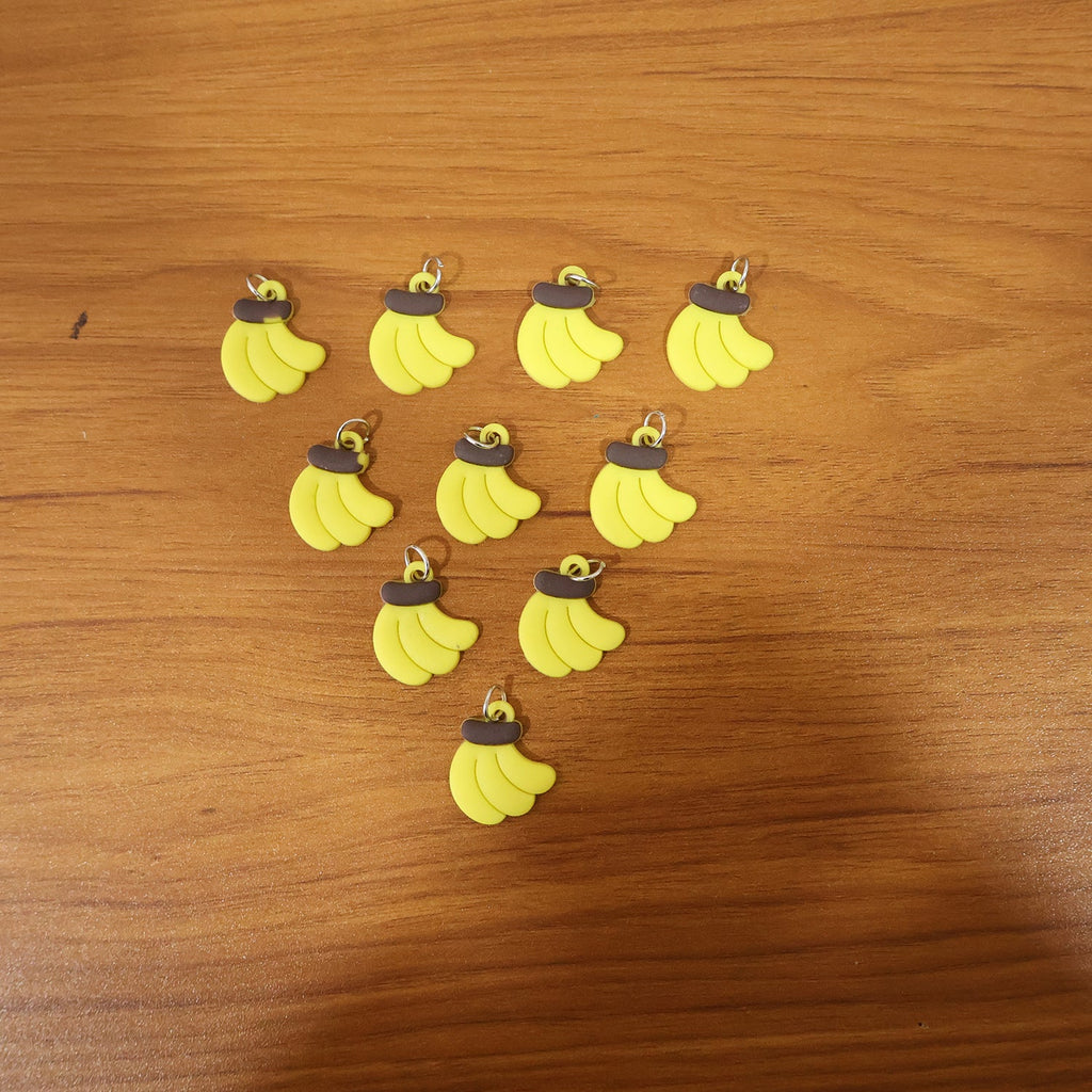 Assorted banana-shaped bag charms in set