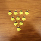Assorted banana-shaped bag charms in set