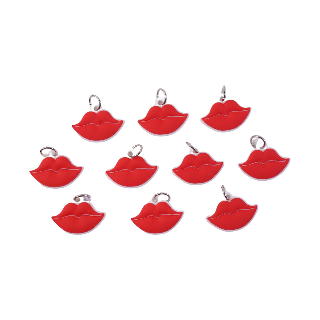 Lightweight lips-shaped keychain hanging on a bag handle