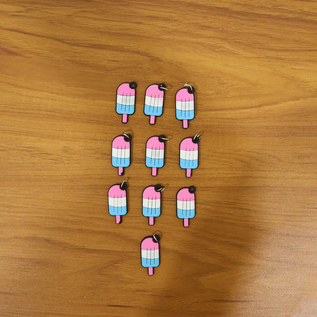Display of ice cream bag charms on surface for accessories