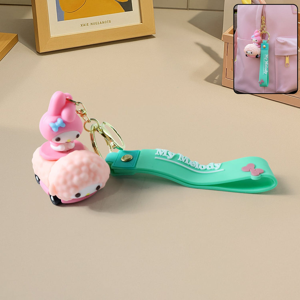 Close-up of cartoon silicone keychain with flexible strap on white background