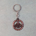 Metal Jai Shree Shyam keychain displaying intricate engraving and crystals