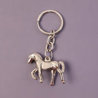 Stylish chrome horse shape keychain attached to key ring
