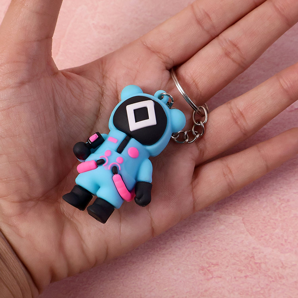 Squid Game themed silicone keychain with metal attachment